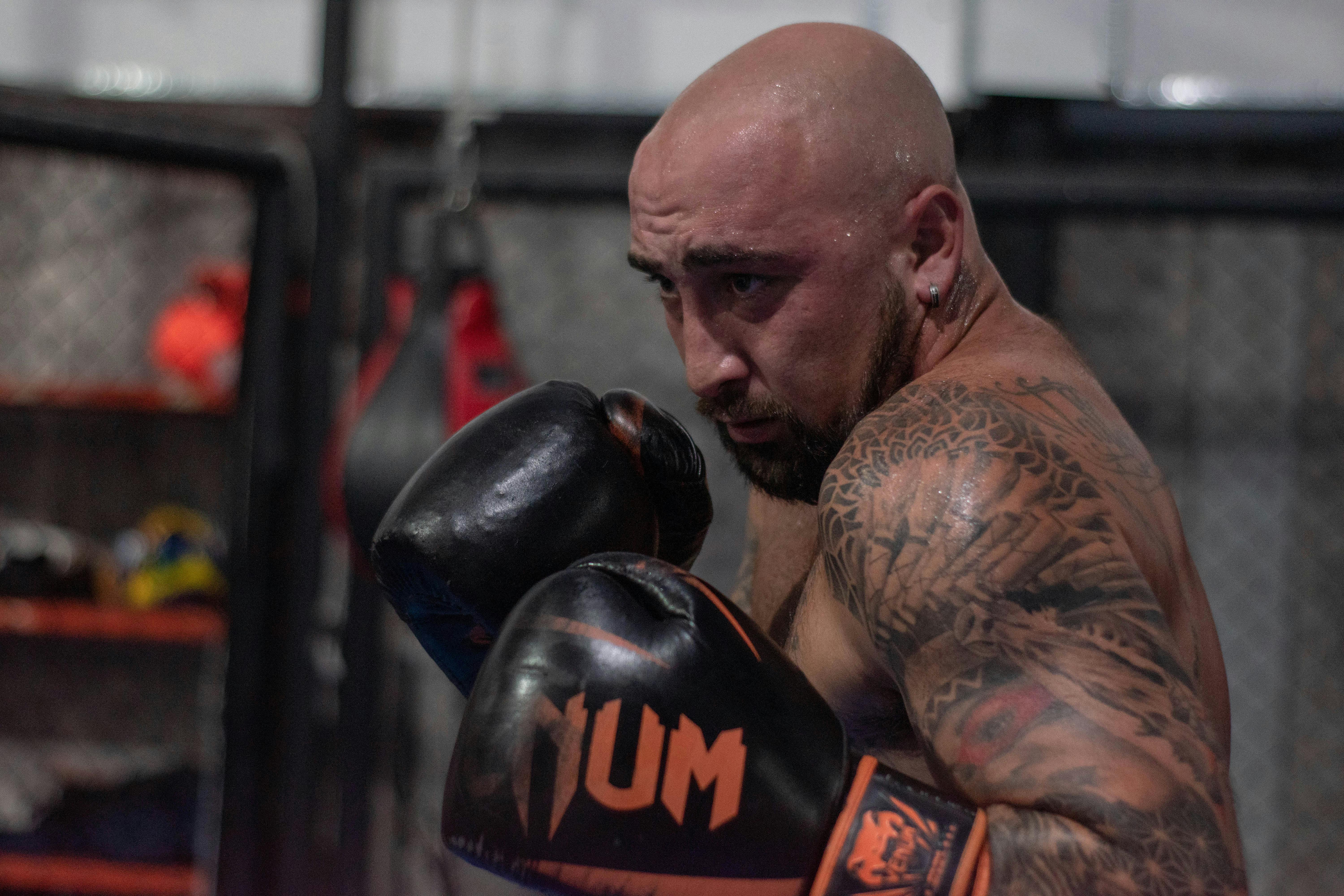 Free Shirtless Man in Boxing Pose Stock Photo