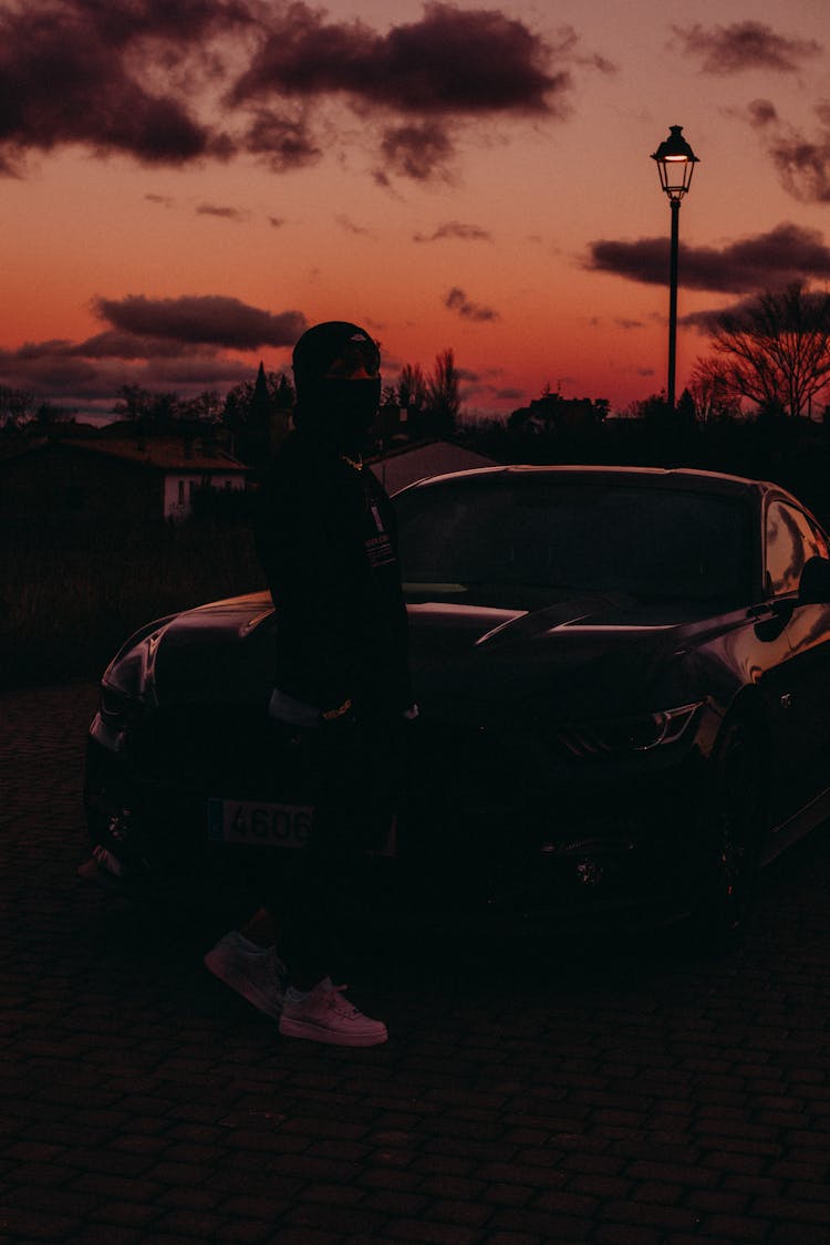 Man With Ford Mustang At Dusk