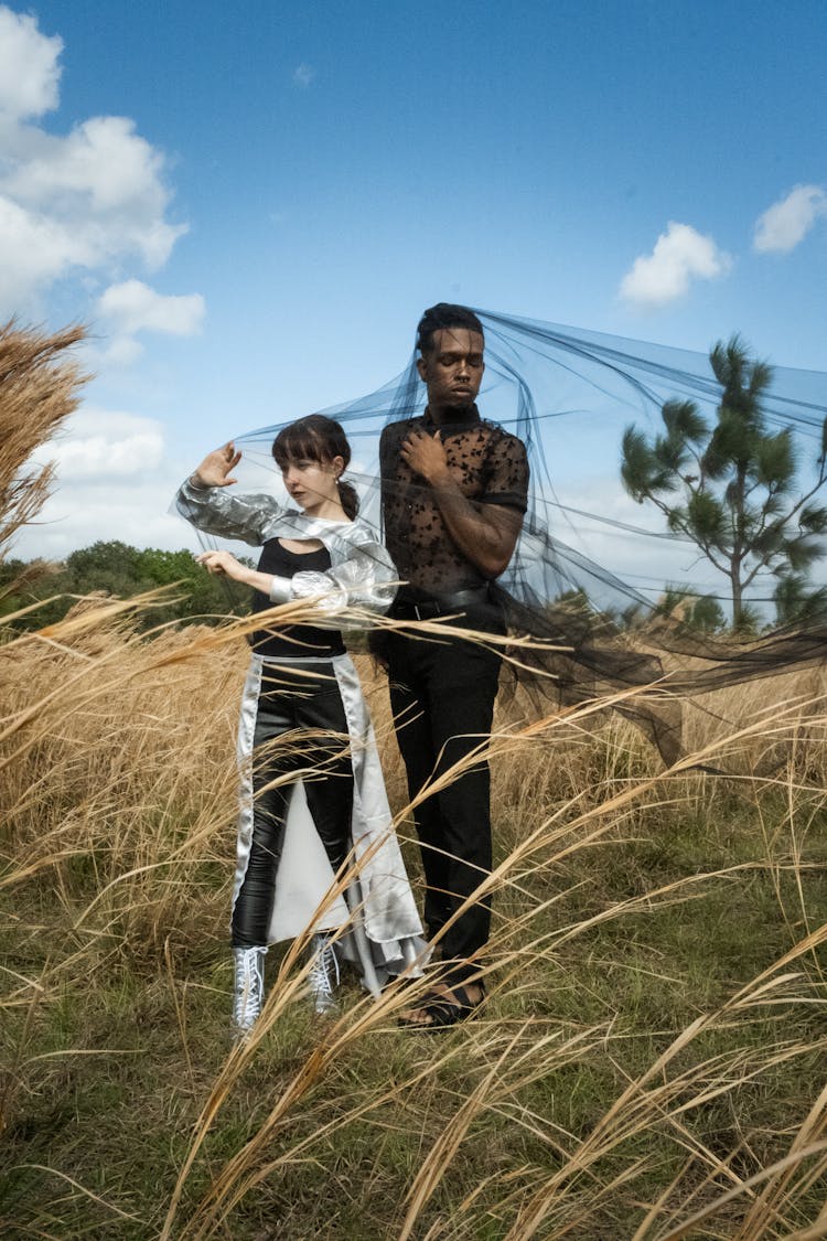 Models Posing In Rural Scenery