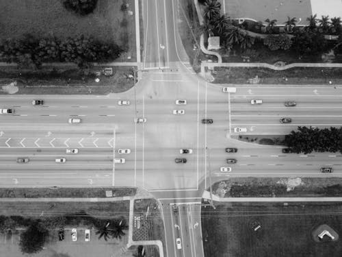 Grayscale Photo of Top View Photography of Road With Vehicles