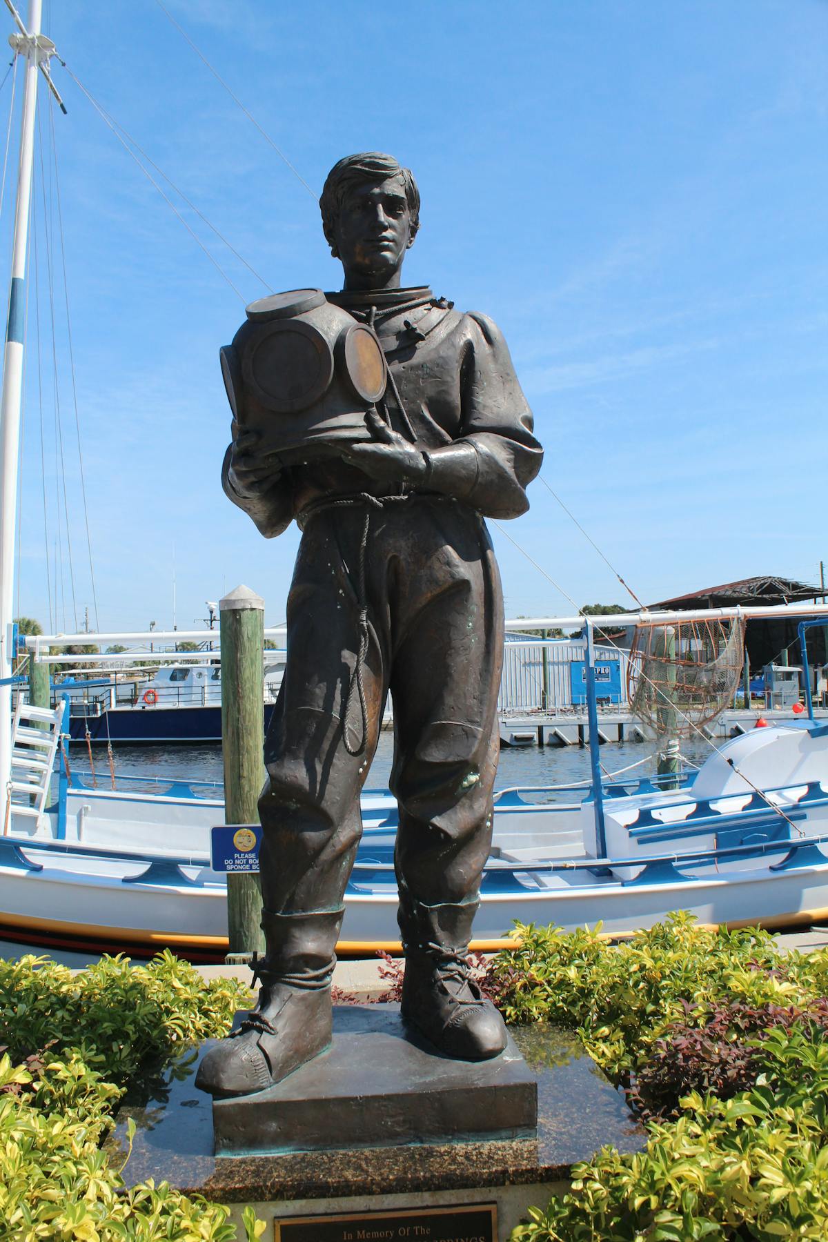 Close-up of medieval knight armor and sword in muted light