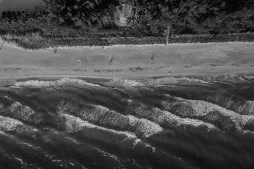 Bird's-view and Grayscale Photography of Body of Water