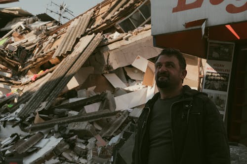 Бесплатное стоковое фото с здание, землетрясение, мужчина