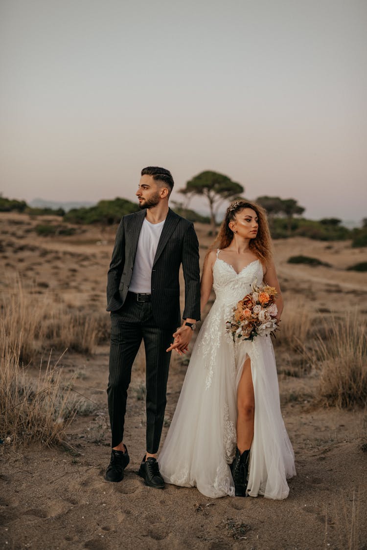 Wedding Couple On A Field