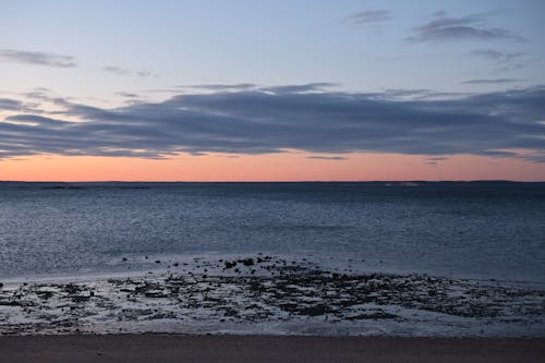 Calm Sea Shore at Sunset