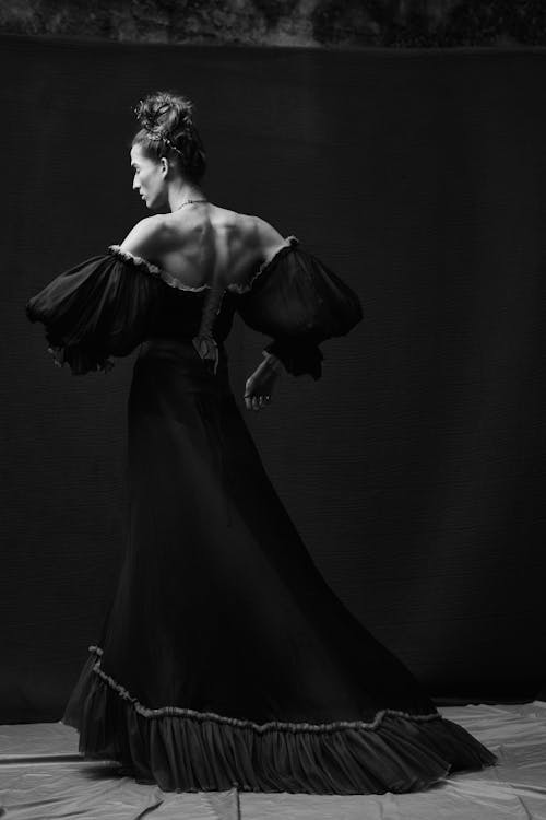 Back View of Woman in Dress in Black and White