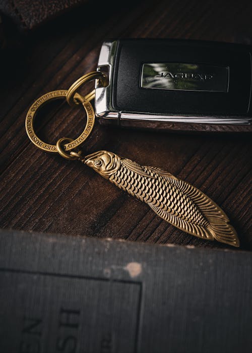 Fish-shaped Brass Keychain Attached to the Jaguar Key Fob