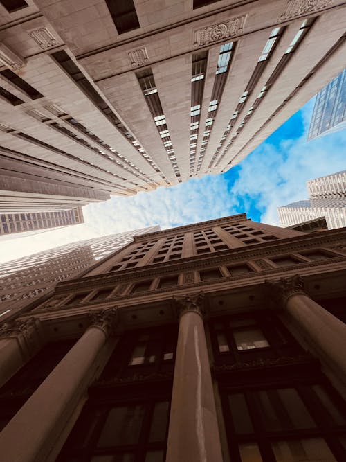 Free Low Angle Shot of Skyscrapers in City  Stock Photo