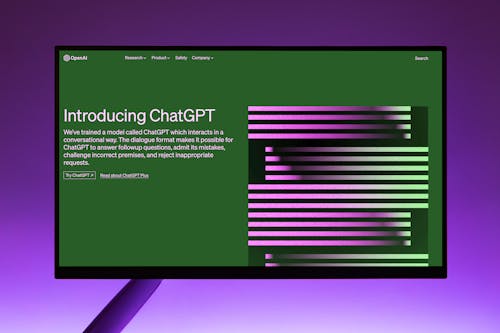Free OpenAI Website with Introduction to ChatGPT on Computer Monitor Stock Photo
