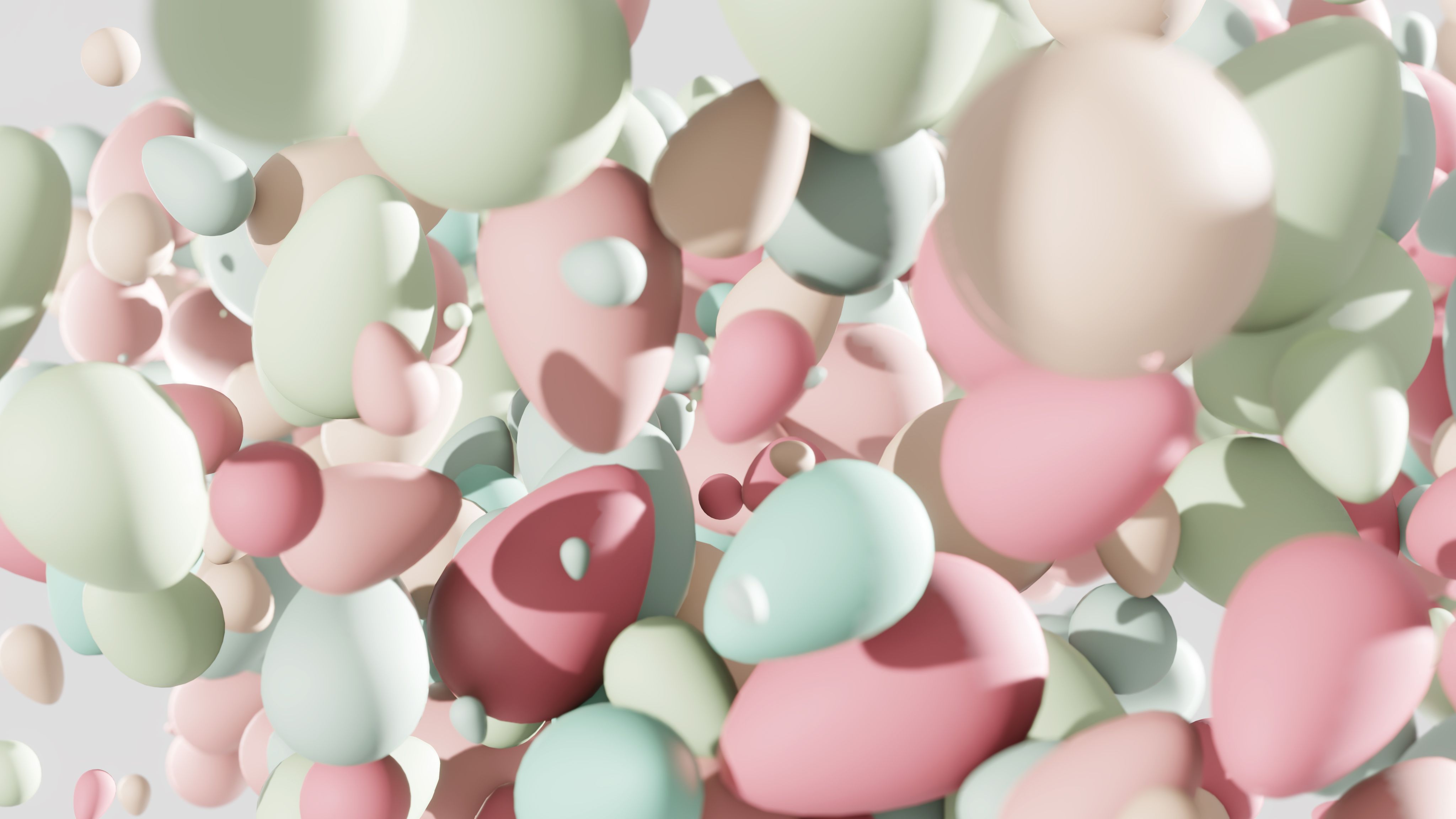 A bunch of pink and green balloons floating in the air · Free Stock Photo