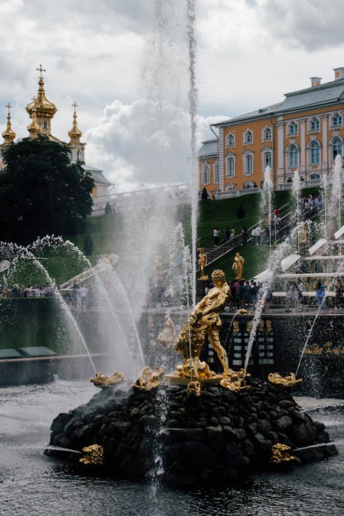 Golden Statue on Fountain in Historic Palace