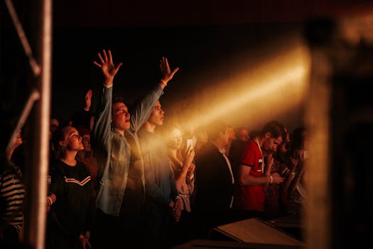 Audience captivated by live music with emotional engagement and vibrant atmosphere.