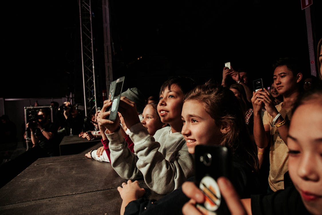 Free Happy Children near Stage on Concert Stock Photo