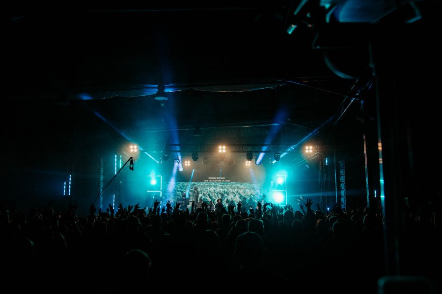 Audience enjoying live music at night — photo by Danik Prihodko on Pexels