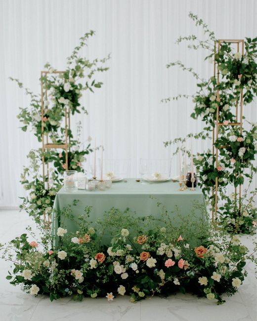 Beautiful table setting with floral arrangements for a special occasion or wedding.