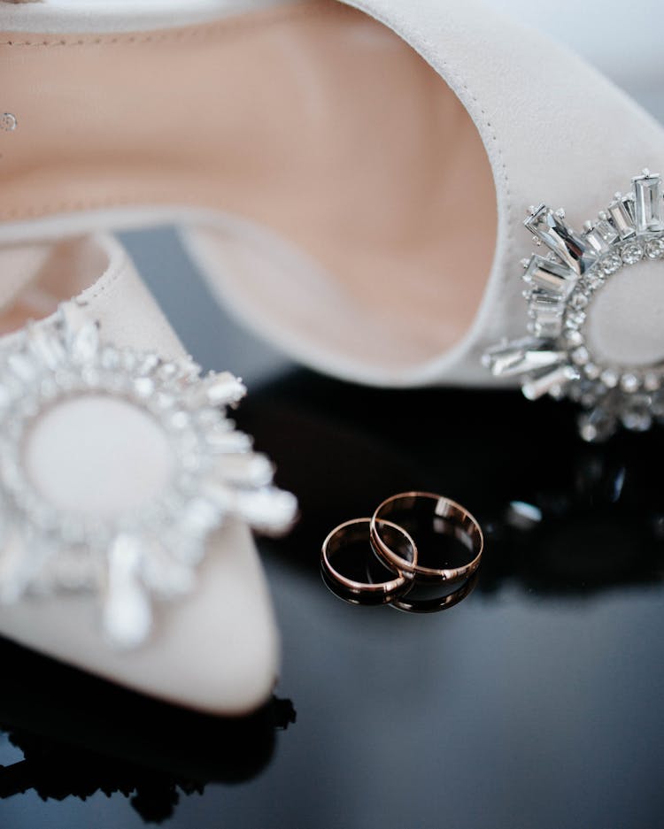 Close Up Of Rings And Shoes