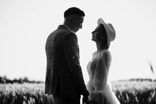Newlyweds on Field in Black and White