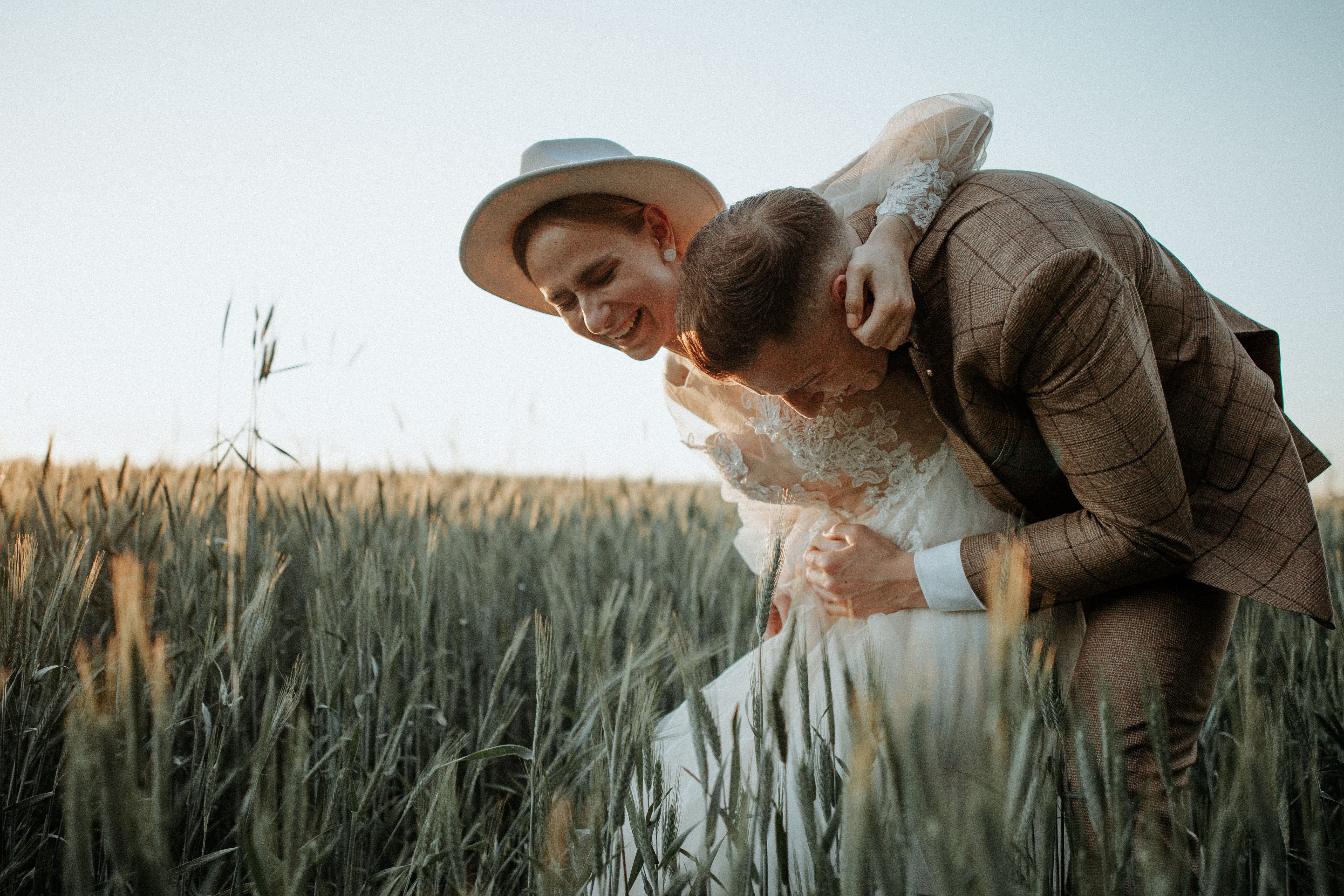 Couple sharing a romantic moment outdoors during golden hour