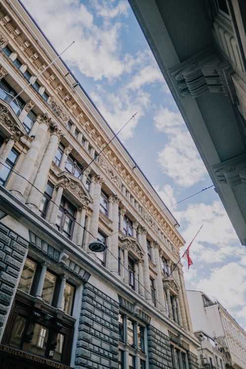 Free Stunning view of a historic building facade in İstanbul against a bright blue sky. Stock Photo