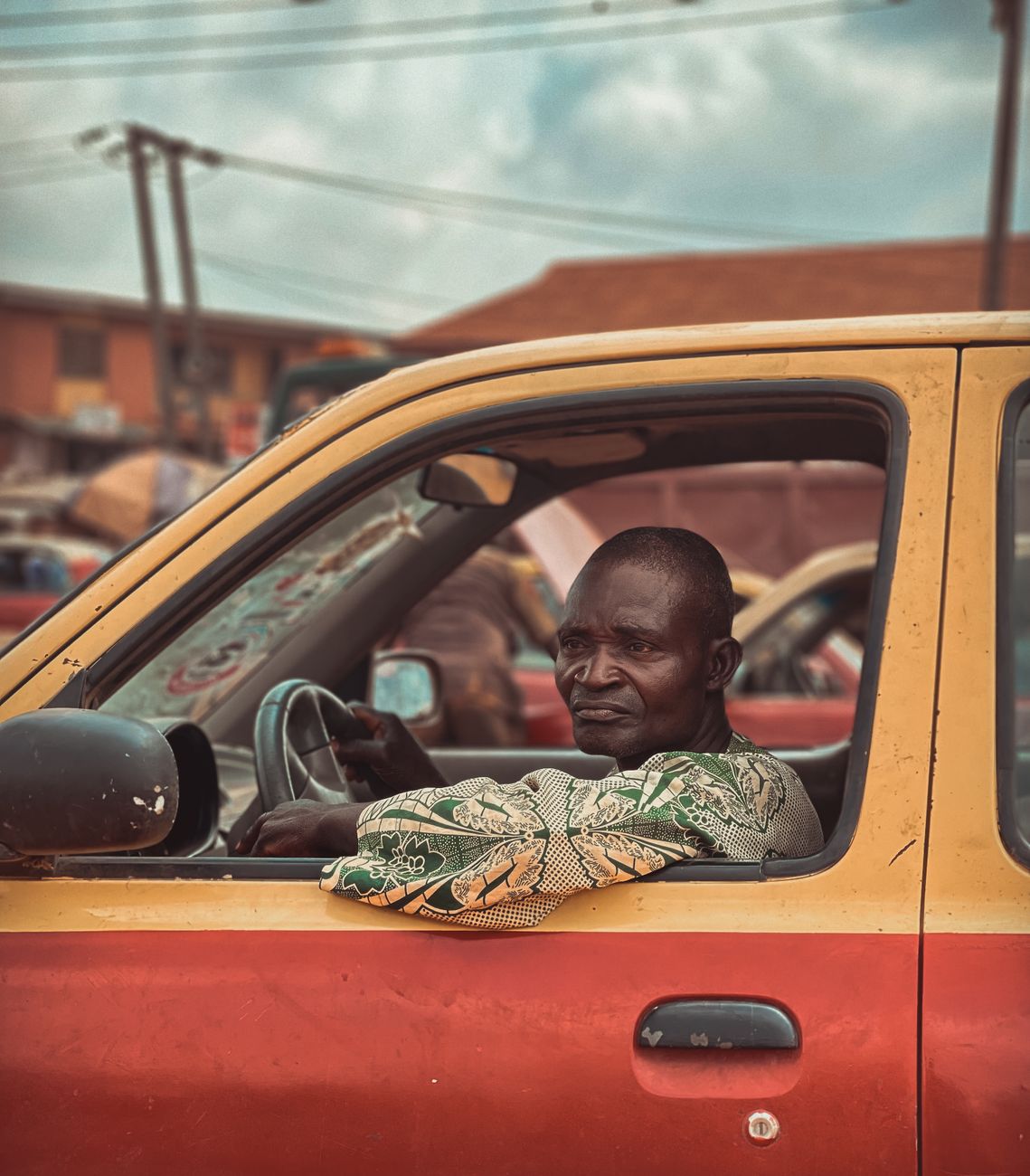 Nigerian automotive scene in Ibadan representing a guided vehicle request