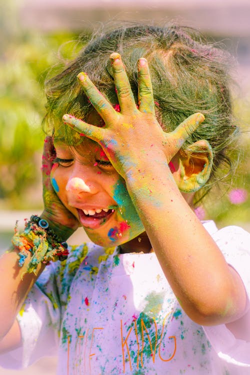 Colorful Powder on Smiling Girl