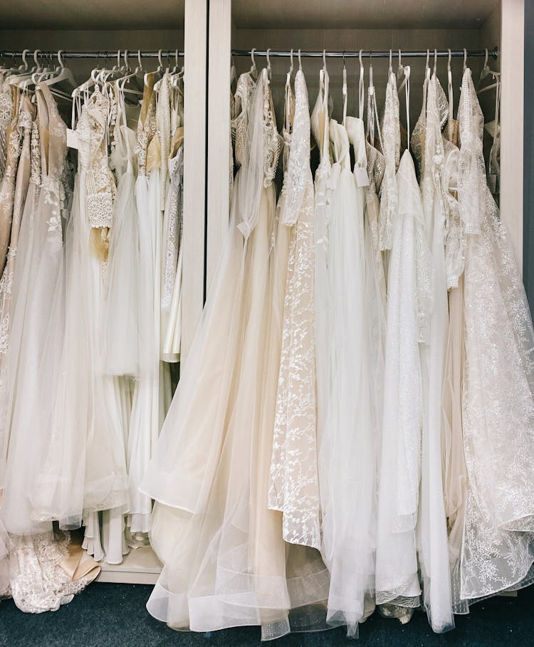 Wedding Dresses Hanging In Shop