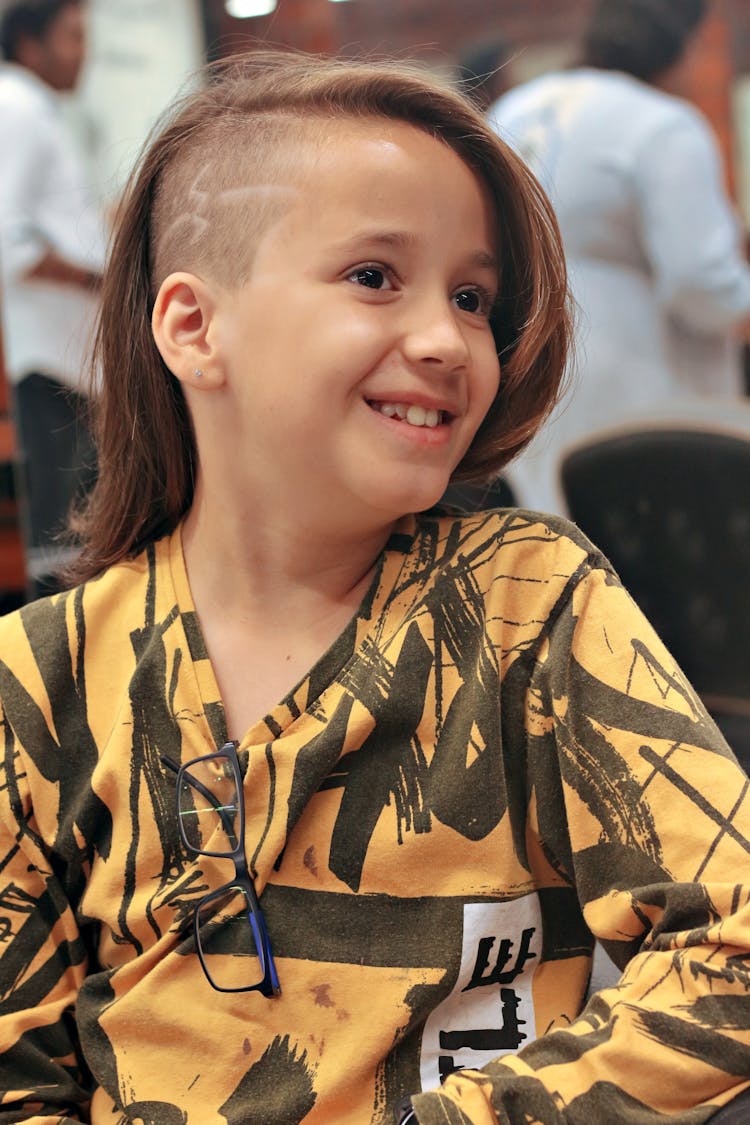 Smiling Child With Creative Haircut