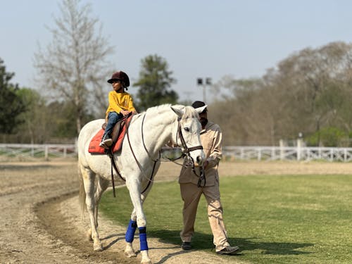 Boy Riding Horse