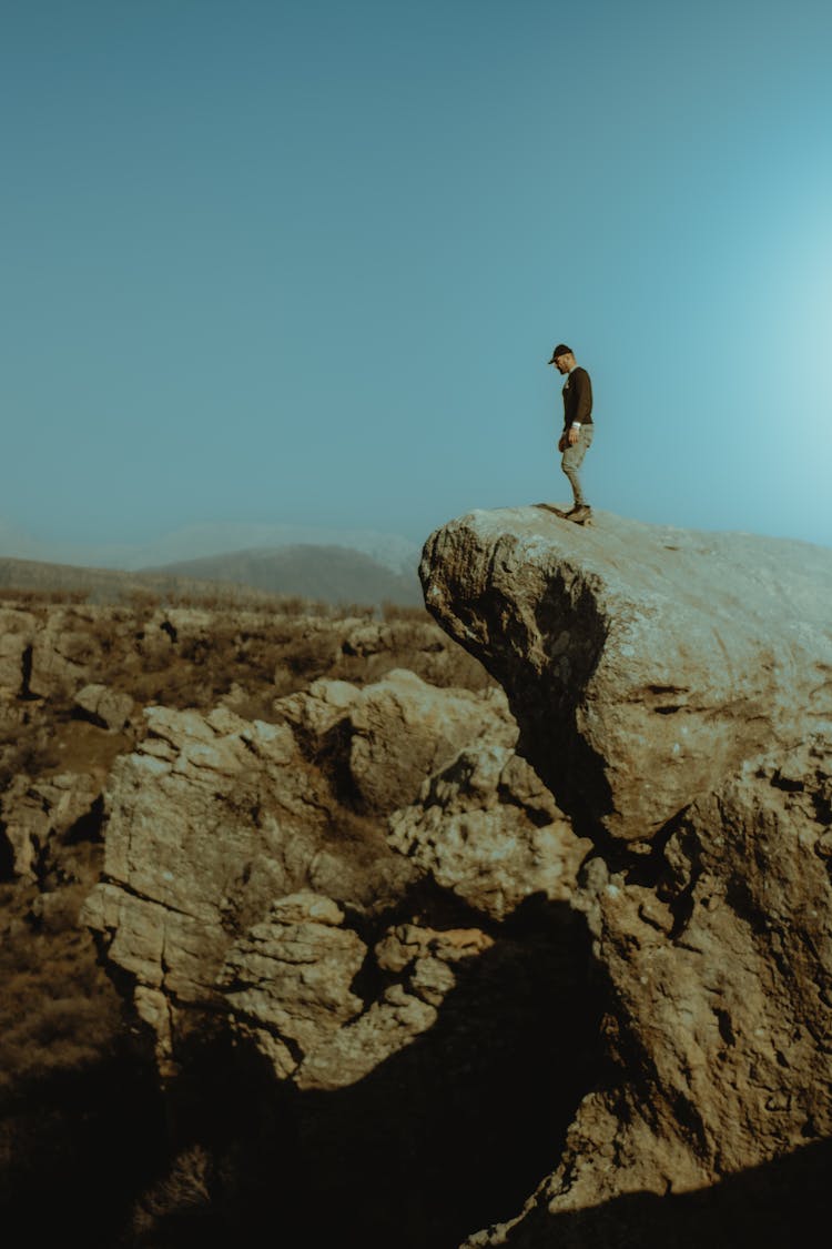 Man On Rock Formation