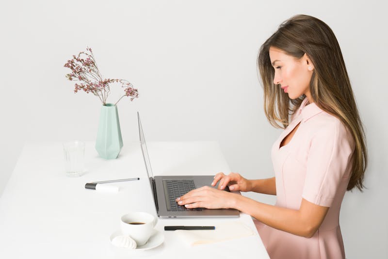 a woman working on a laptop