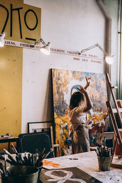 Woman Dancing in Painting Workshop