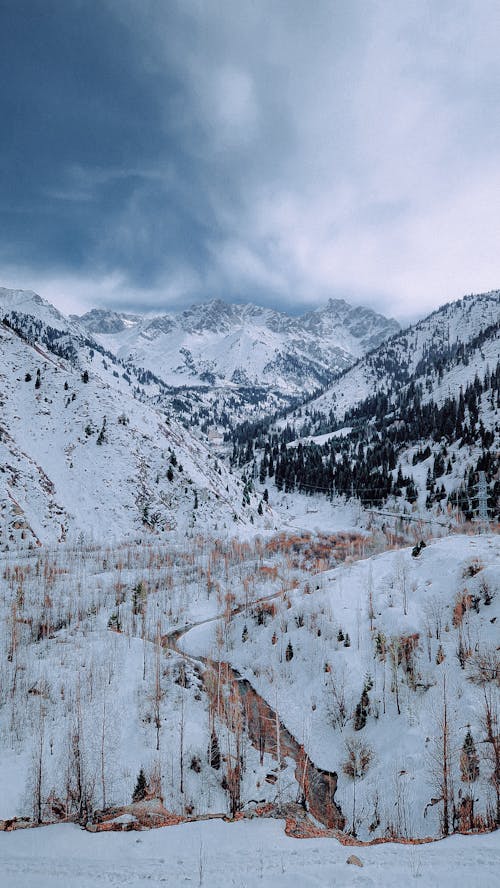 River in Mountain Snowed Valley