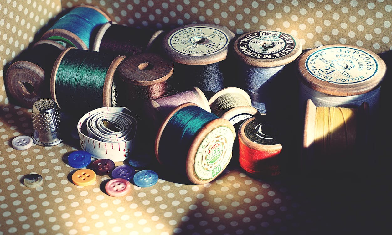 Free stock photo of buttons, cotton reels, cotton thread