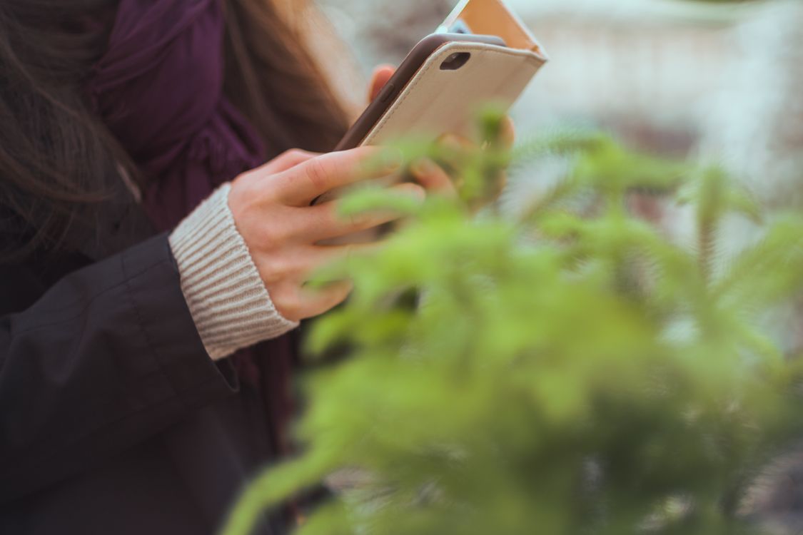 Person Using Black Android Smartphone · Free Stock Photo