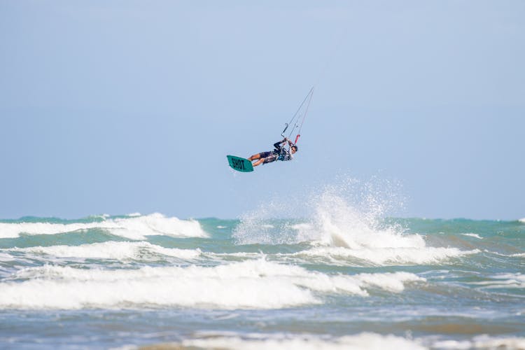 Kitesurfing Over Waves