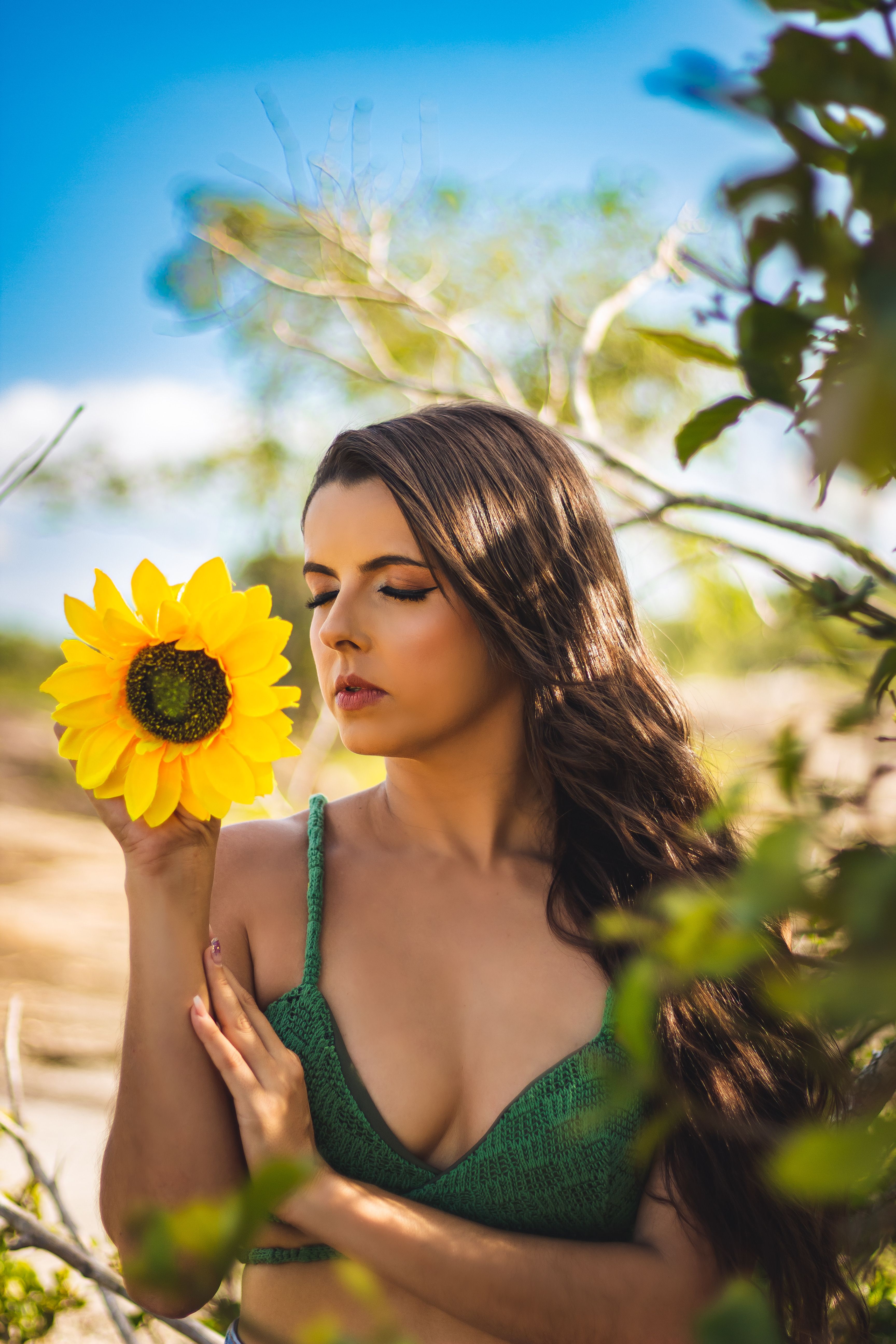 Young Woman in the Garden Holding a Sunflower · Free Stock Photo