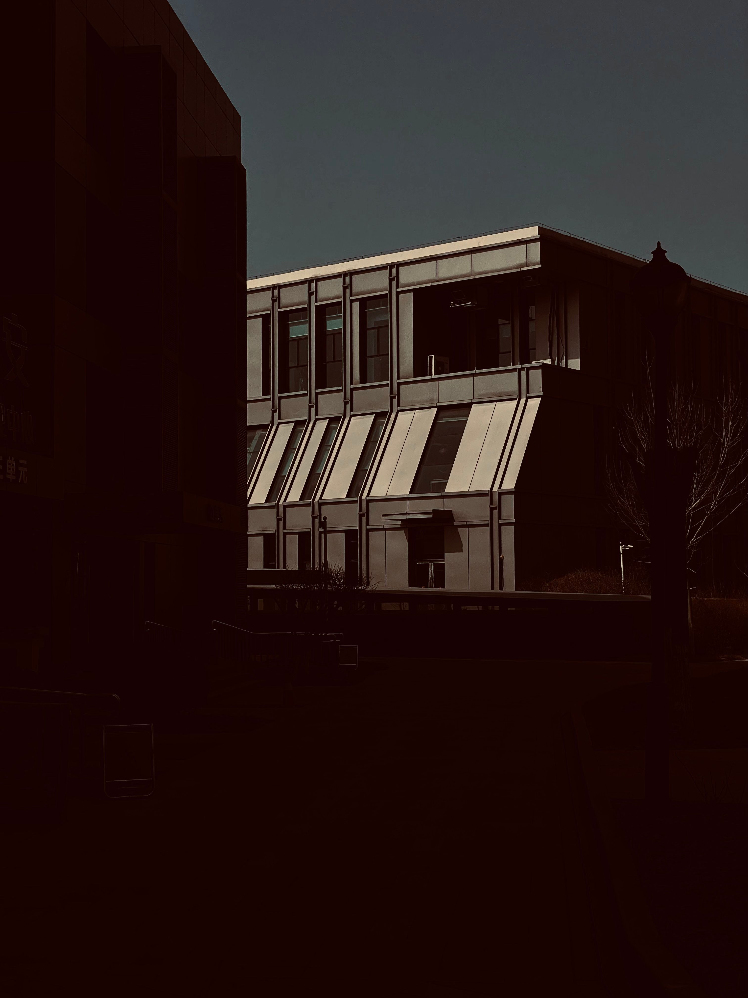 Modern architecture against a dark sky