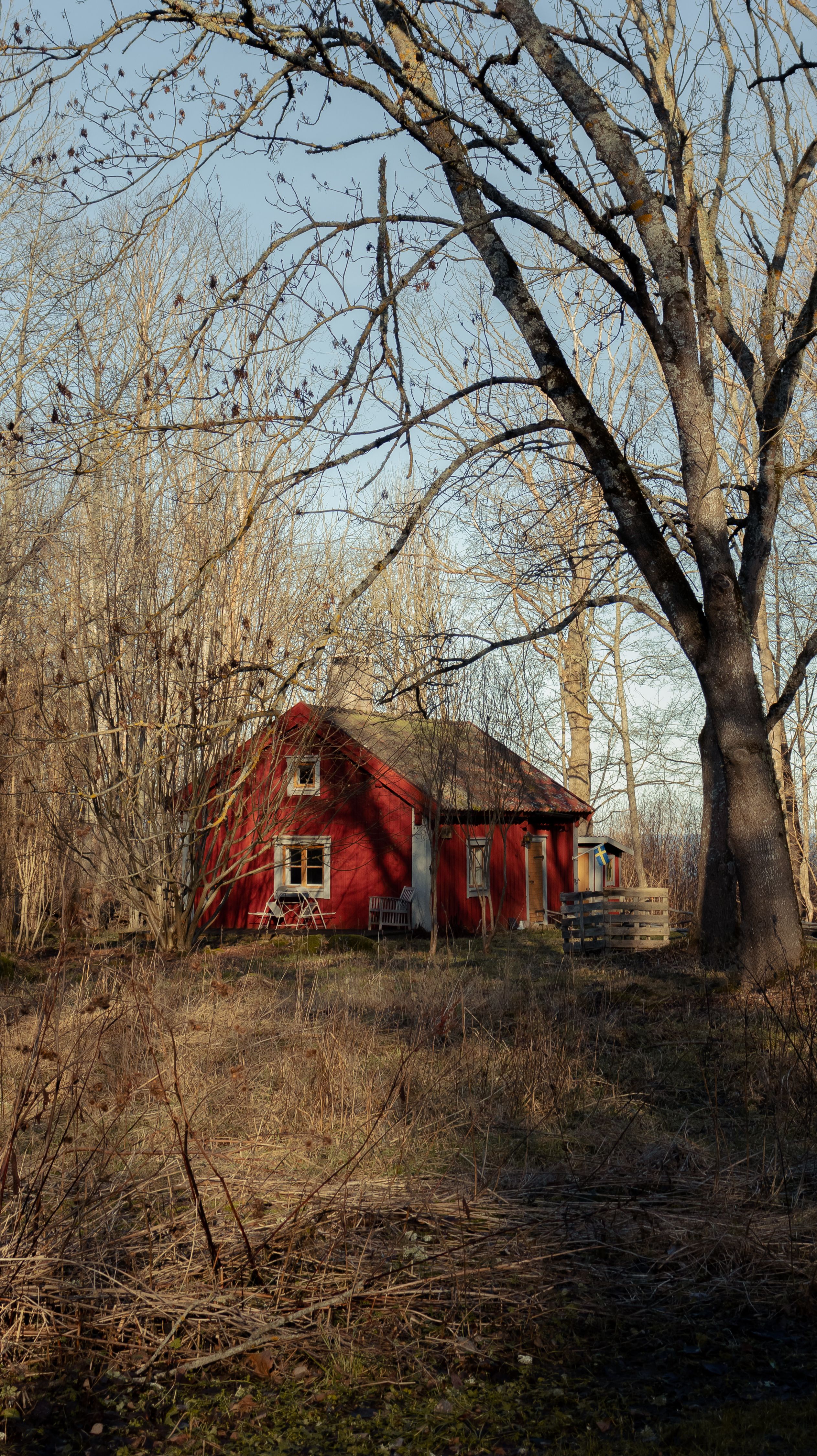 Brown Wooden House Near the Creek With a Bridge · Free Stock Photo