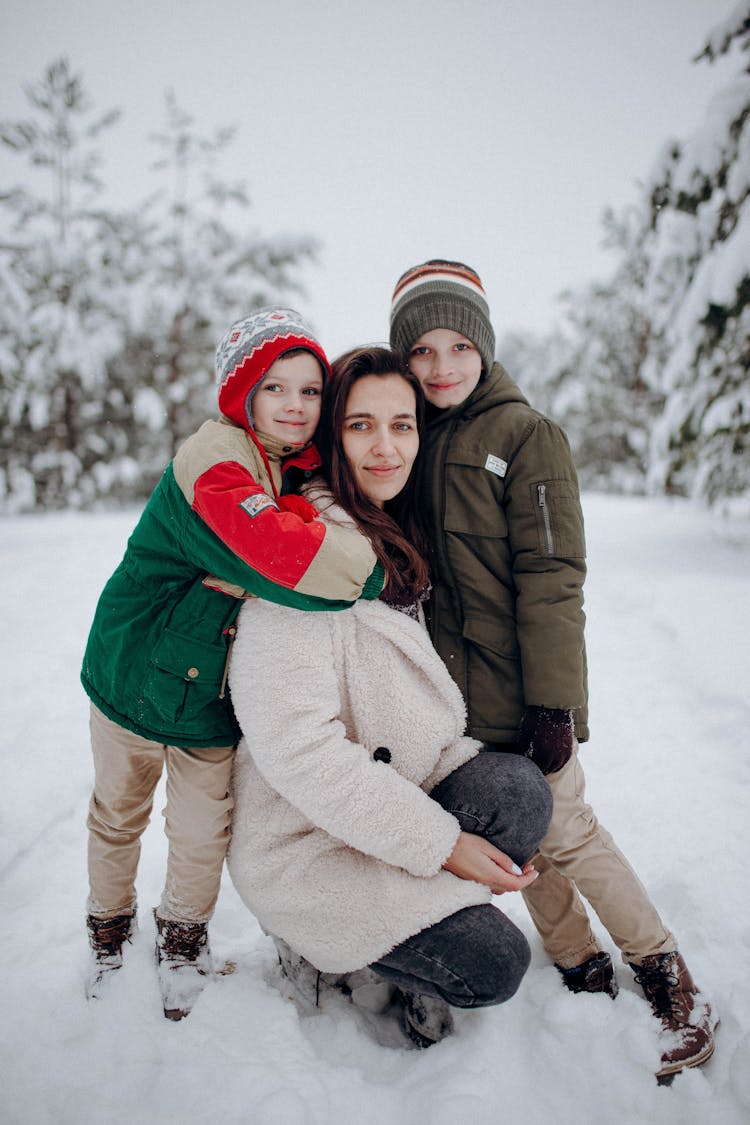 Family Having Fun On Snow