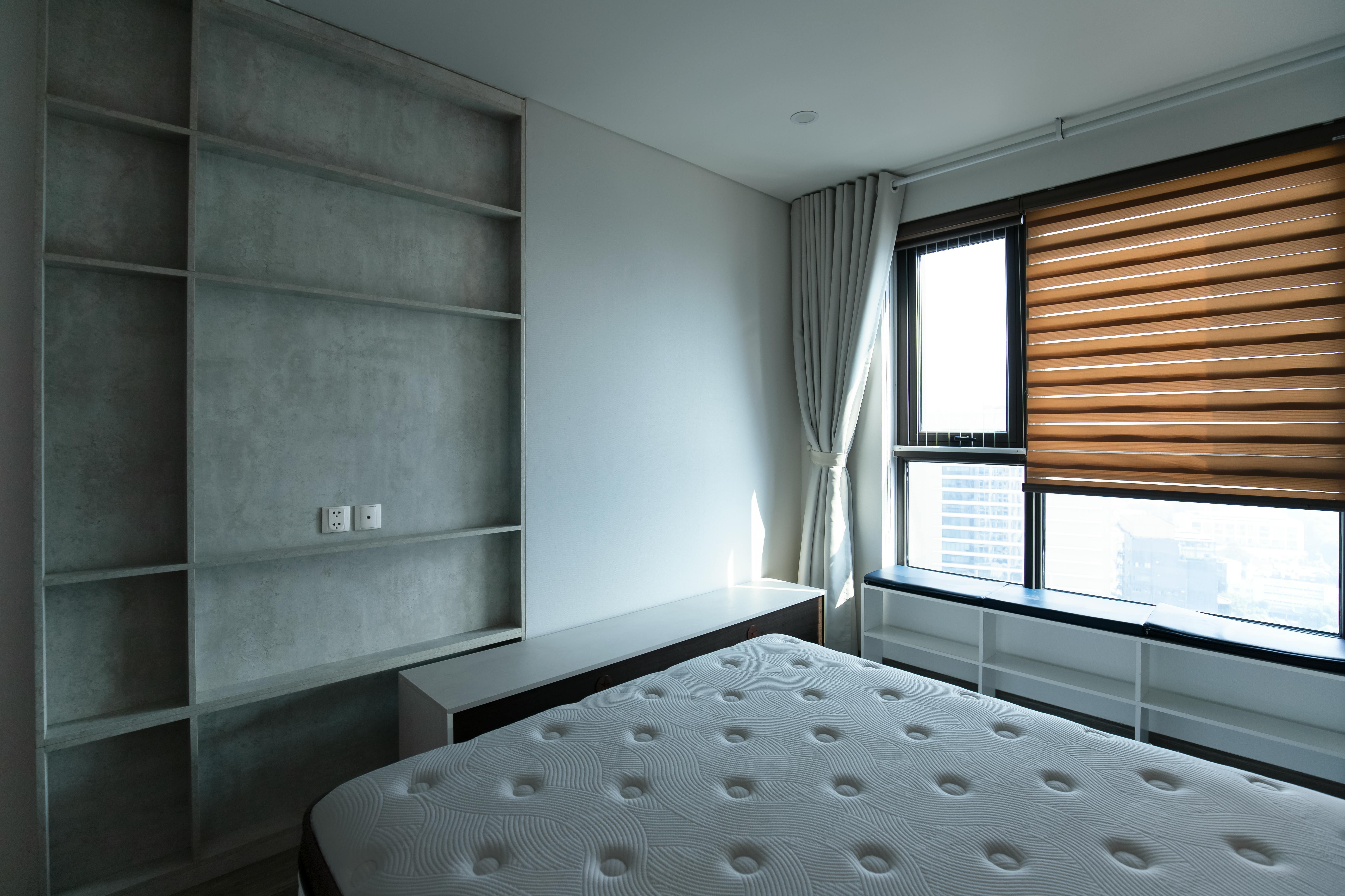 Corner of a Small Empty Room with a Mattress · Free Stock Photo