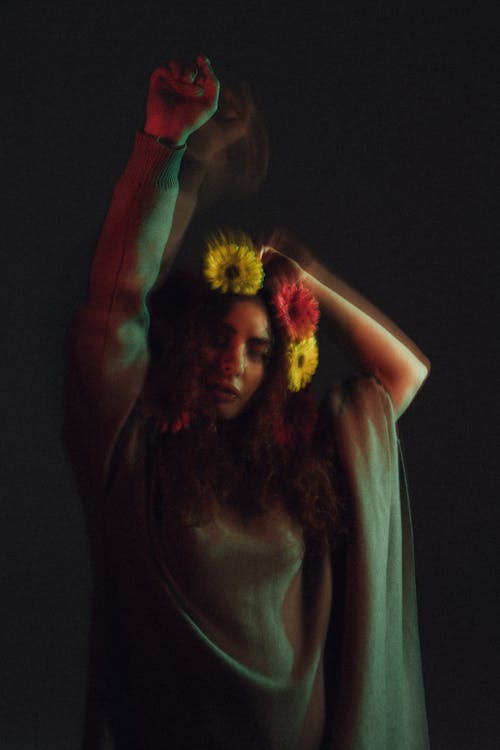 Blurred Dancing Woman with Garland on Head