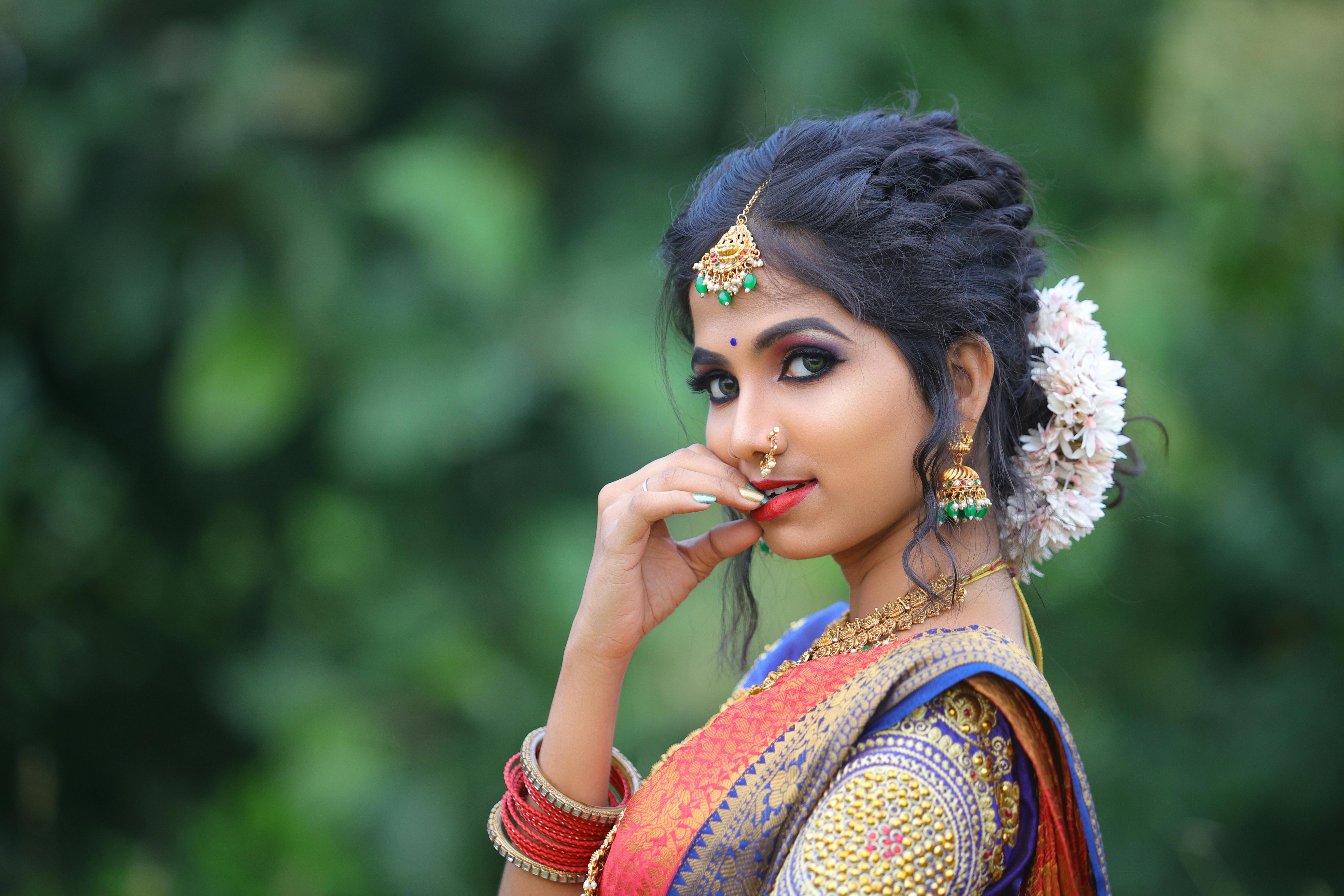 Free Photos - Three Indian Women, Elaborately Dressed And Wearing  Traditional Indian Clothing. They Are Heavily Adorned With Gold Jewelry,  Showcasing Their Cultural Heritage And Beauty. The Photo Captures The  Essence Of
