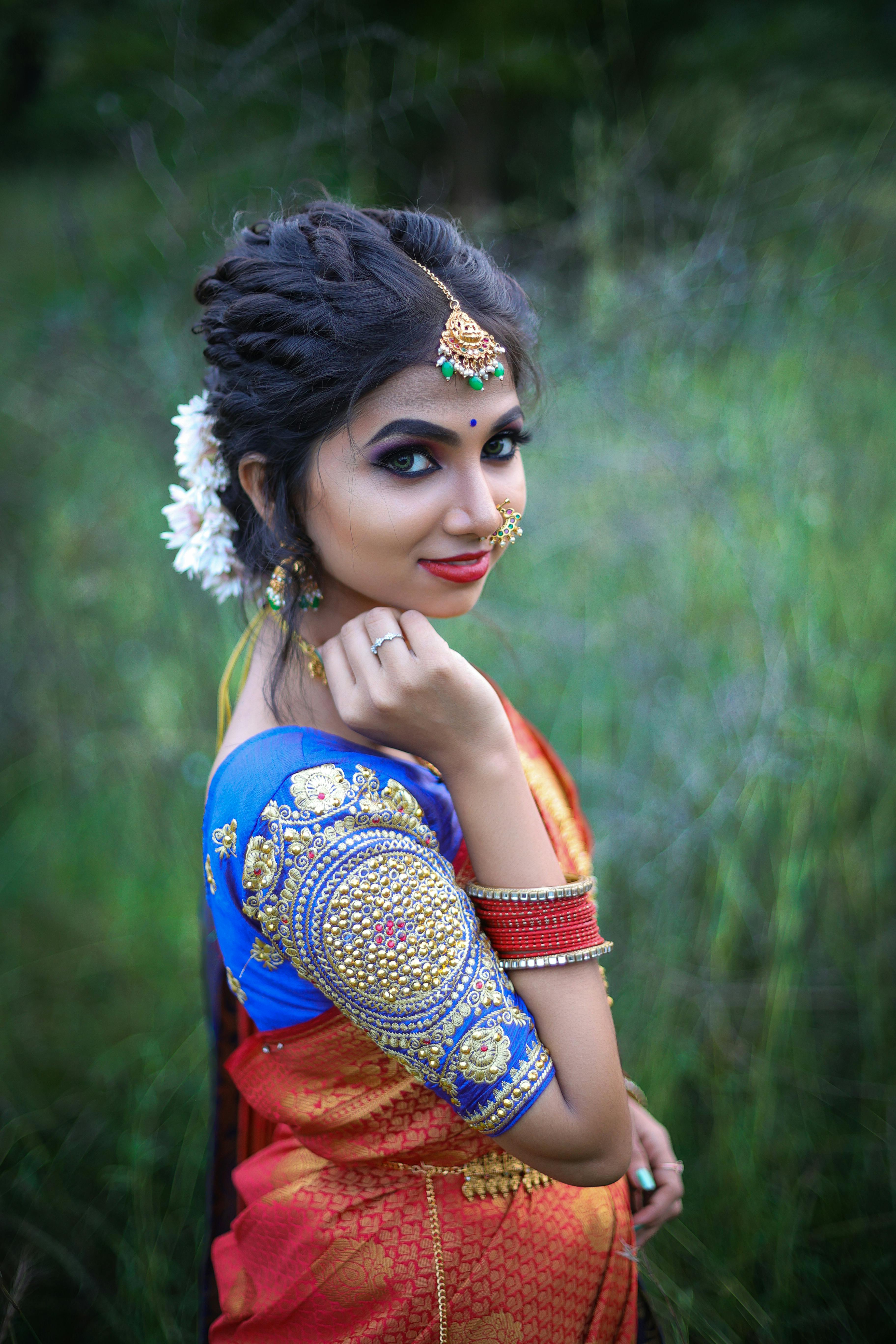 Premium Photo | Indian beautiful young girl in traditional saree posing  outdoors