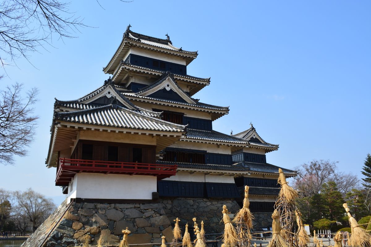 Matsumoto Castle close-up showing black lacquer exterior and traditional roof architecture — Matsumoto City, Nagano