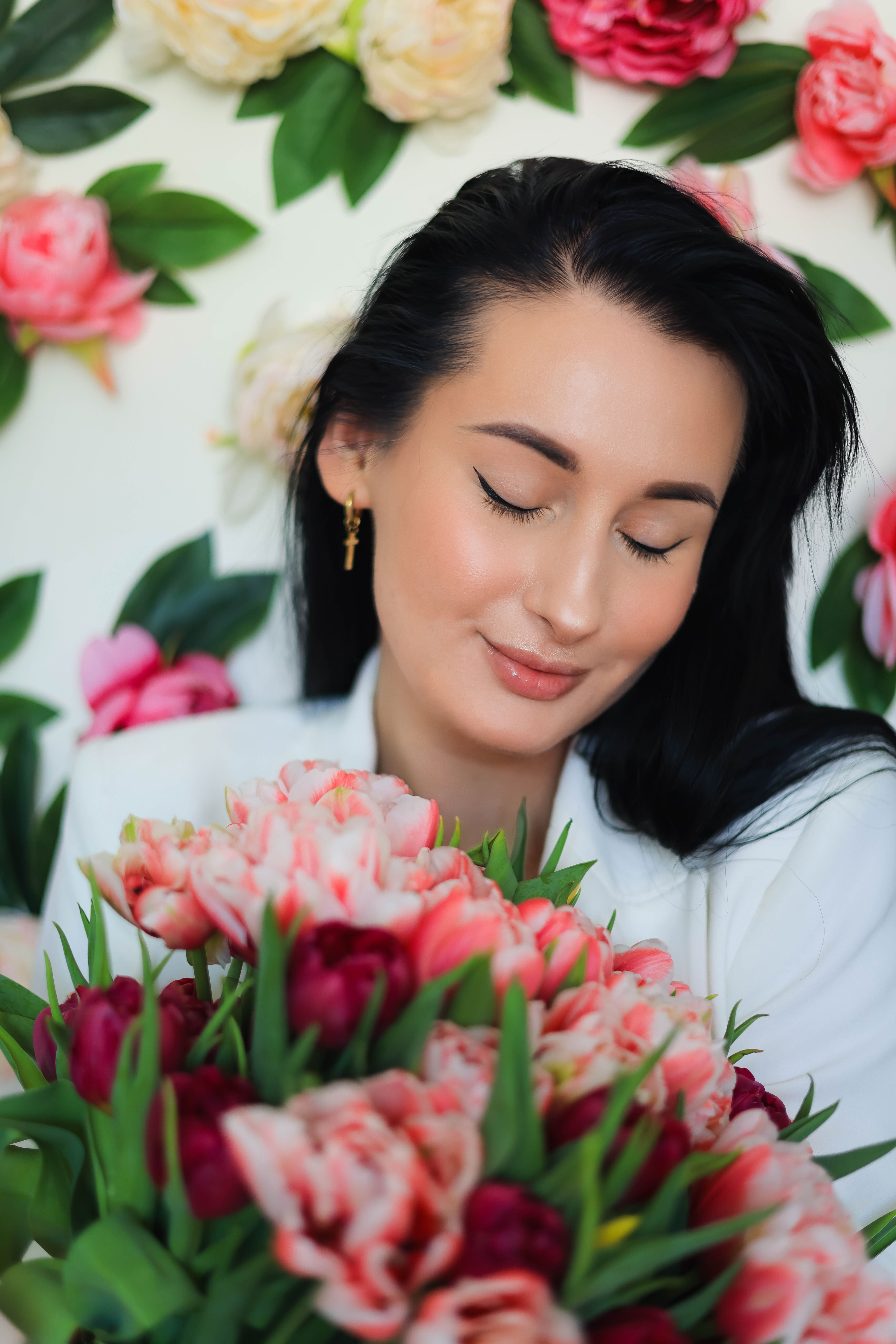 Portrait of Woman Holding Bouquet of Pink Flowers · Free Stock Photo