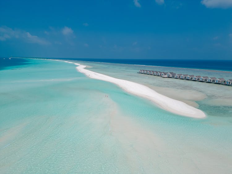 Shoal Extending Into Turquoise Sea