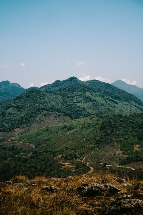 Free Beautiful mountain range with lush greenery, perfect for hiking and exploring nature. Stock Photo