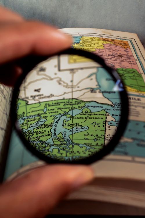 Magnifying Map Magnifying Glass on a Map · Free Stock Photo