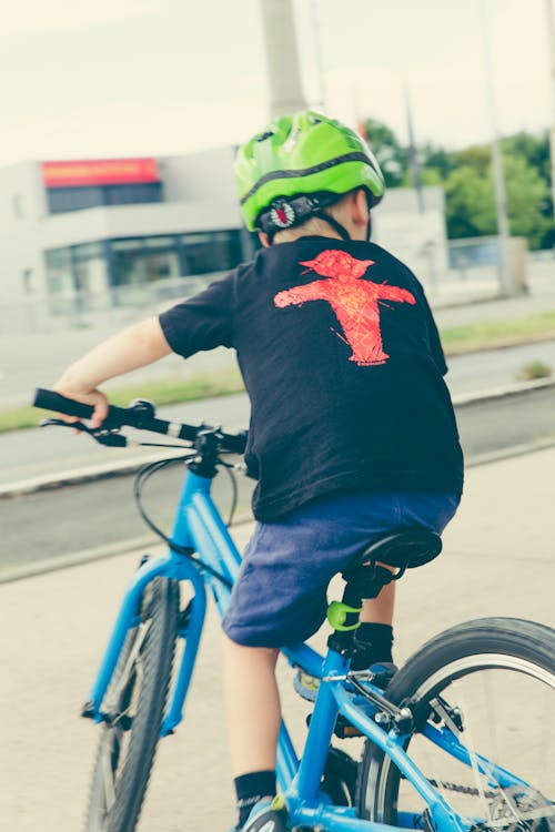 Boy Riding Bicycle