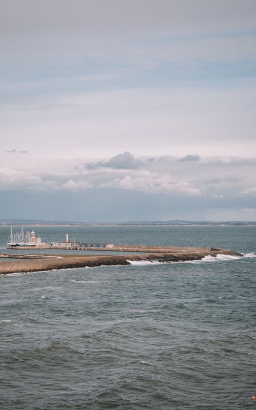 Sea Waves Splashing on Pier